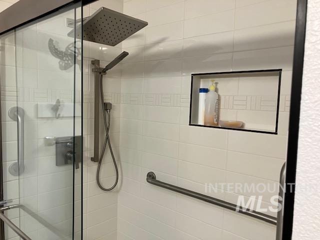 bathroom with a stall shower