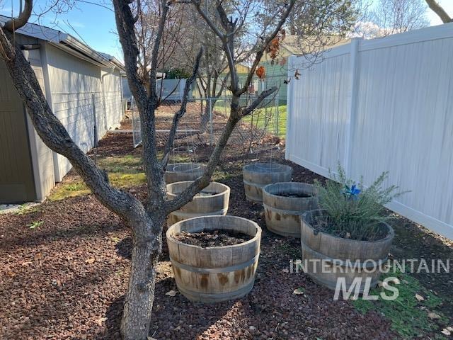 view of yard featuring fence