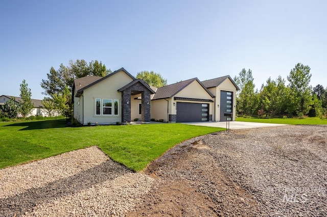 view of front of property featuring stucco siding, concrete driveway, an attached garage, a front yard, and stone siding