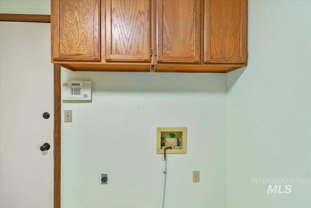 16476 Ustick Rd, Caldwell, ID 83607 - laundry area with cabinet space, electric dryer hookup, and washer hookup