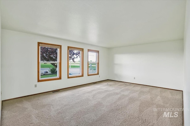 16476 Ustick Rd, Caldwell, ID 83607 - spare room with carpet floors and baseboards
