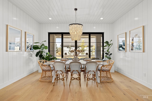 dining space featuring recessed lighting, a notable chandelier, light wood-style flooring, and wooden ceiling