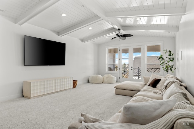 carpeted living area featuring french doors, baseboards, a ceiling fan, and vaulted ceiling with beams