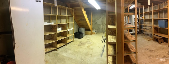 unfinished basement with stairway