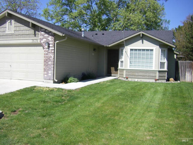 7678 Edgebrook Dr, Nampa, ID 83687 - ranch-style house featuring a garage, concrete driveway, and brick siding