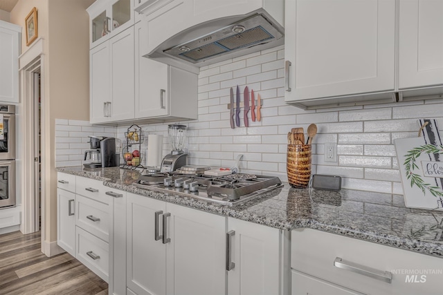 420 Poppy St, Fruitland, ID 83619 - kitchen with extractor fan, white cabinetry, glass insert cabinets, and stainless steel gas stovetop