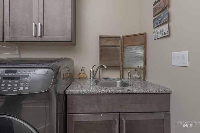 420 Poppy St, Fruitland, ID 83619 - laundry area with cabinet space and independent washer and dryer
