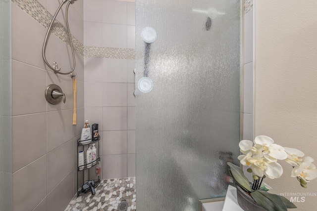 420 Poppy St, Fruitland, ID 83619 - bathroom featuring tiled shower