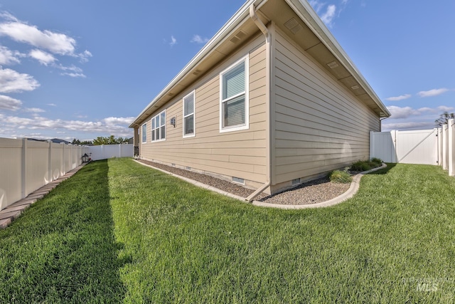 420 Poppy St, Fruitland, ID 83619 - view of side of home featuring crawl space and a gate