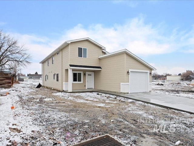 view of front of home featuring an attached garage