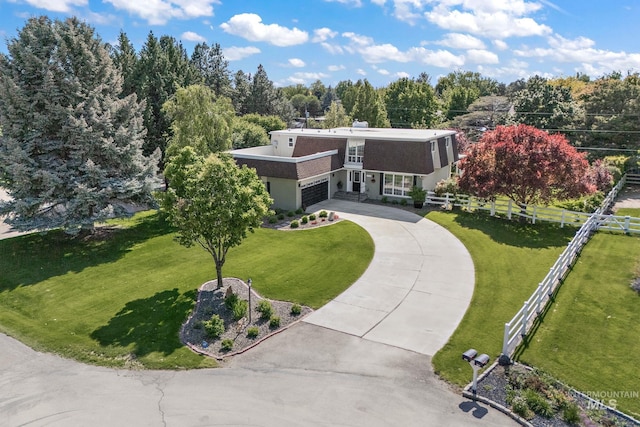 4545 N Columbine St, Boise, ID 83646 - view of front facade with driveway, stucco siding, and an attached garage