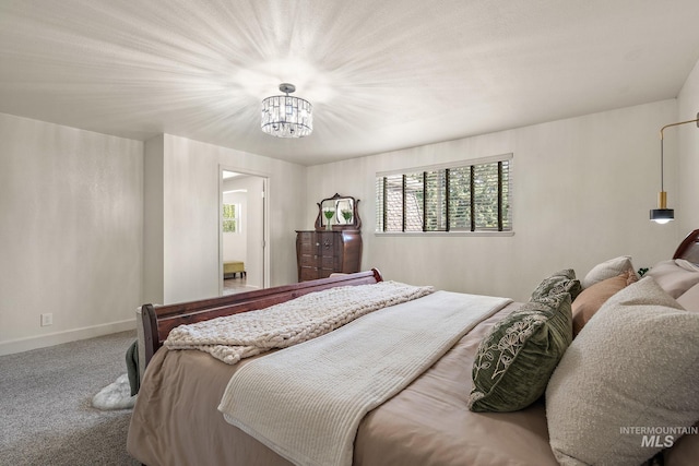 4545 N Columbine St, Boise, ID 83646 - bedroom featuring carpet floors, a chandelier, and baseboards
