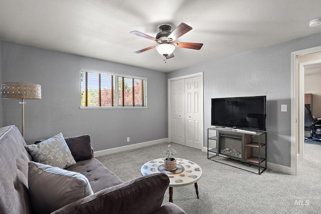 4545 N Columbine St, Boise, ID 83646 - living room featuring a ceiling fan, baseboards, and carpet flooring