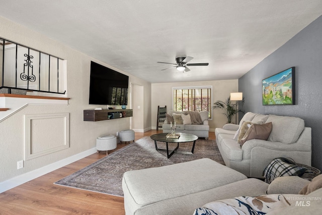 4545 N Columbine St, Boise, ID 83646 - living area featuring wood finished floors, ceiling fan, and baseboards