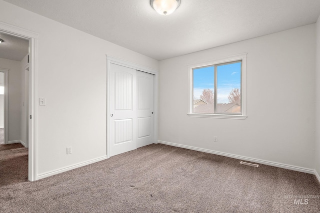 1452 E Pistioa Dr, Meridian, ID 83642 - unfurnished bedroom featuring carpet floors and a closet