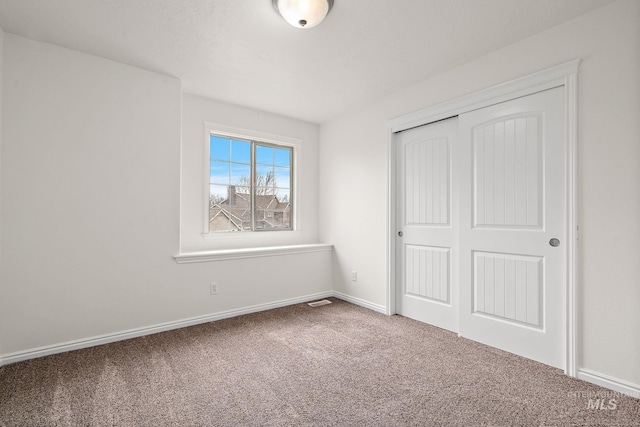 1452 E Pistioa Dr, Meridian, ID 83642 - unfurnished bedroom featuring carpet flooring and a closet