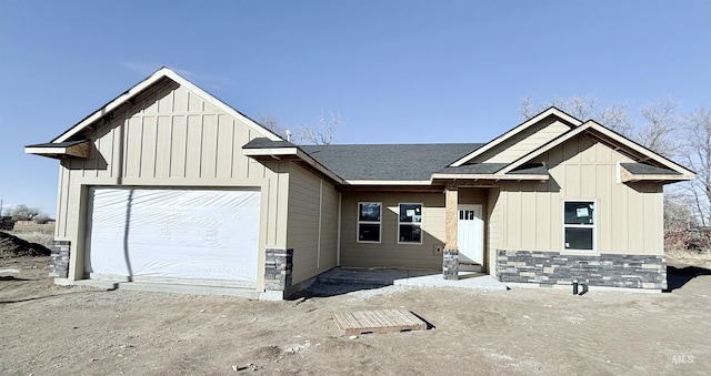 modern farmhouse style home featuring a garage