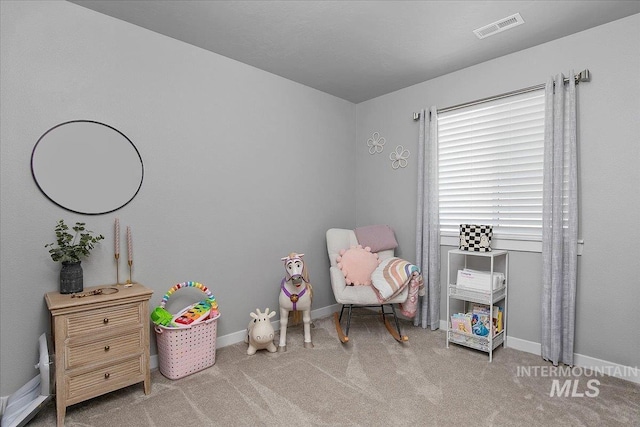 playroom with baseboards, visible vents, and carpet flooring