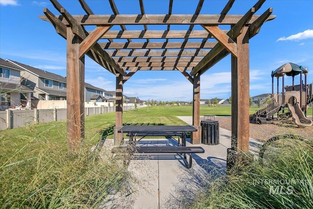 surrounding community featuring a patio, fence, playground community, a yard, and a pergola