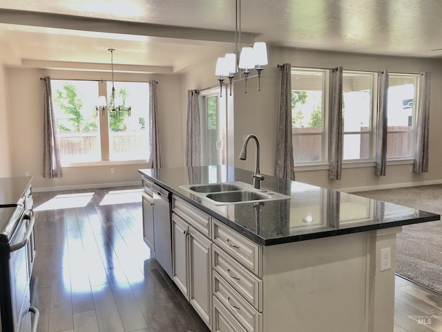 1756 N Hornback Ave, Star, ID 83669 - kitchen with a chandelier, a sink, open floor plan, and a center island with sink