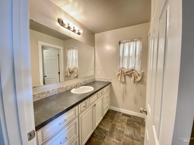 1756 N Hornback Ave, Star, ID 83669 - bathroom featuring vanity and baseboards