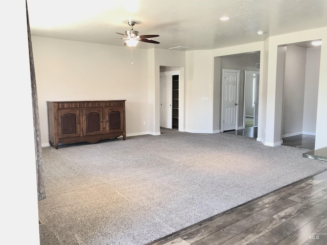 1756 N Hornback Ave, Star, ID 83669 - unfurnished living room with a ceiling fan, baseboards, and wood finished floors