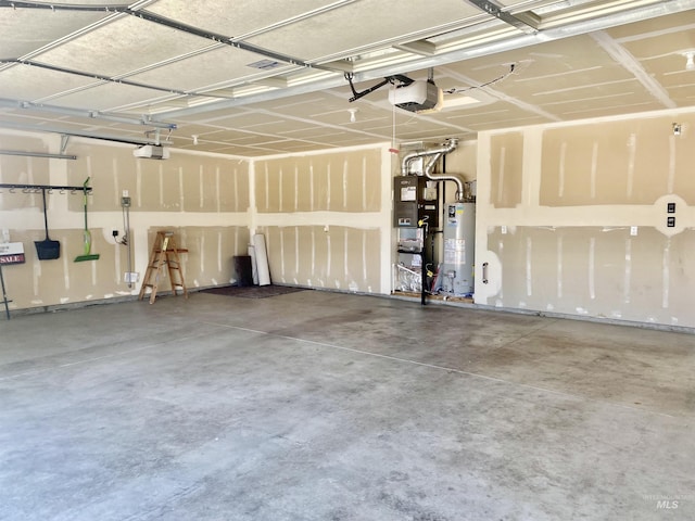 1756 N Hornback Ave, Star, ID 83669 - garage with a garage door opener and water heater