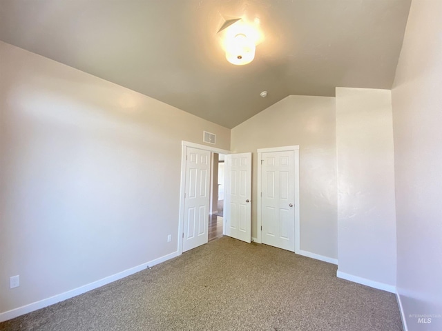 1756 N Hornback Ave, Star, ID 83669 - unfurnished bedroom with vaulted ceiling, carpet, and baseboards