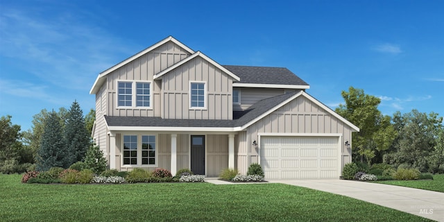 view of front of home featuring a front yard and a garage