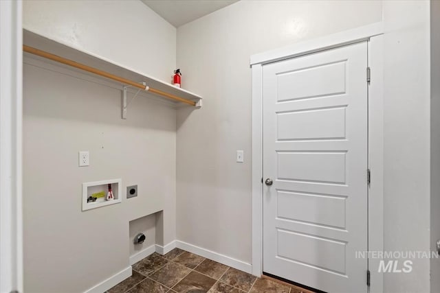 washroom with laundry area, hookup for a washing machine, baseboards, and electric dryer hookup