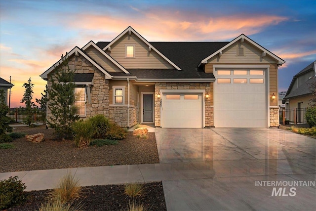 view of front of property featuring a garage