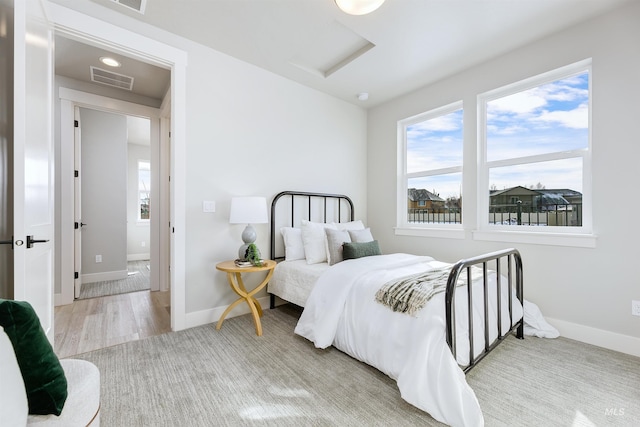 652 N Morning Glory, Eagle, ID 83616 - bedroom with attic access, baseboards, and visible vents