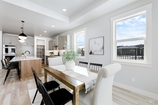 652 N Morning Glory, Eagle, ID 83616 - dining area featuring baseboards, light wood-style flooring, and recessed lighting