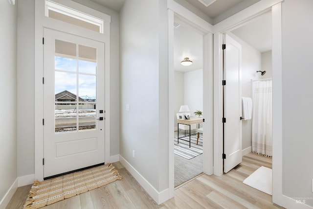 652 N Morning Glory, Eagle, ID 83616 - entryway with baseboards and light wood-style flooring