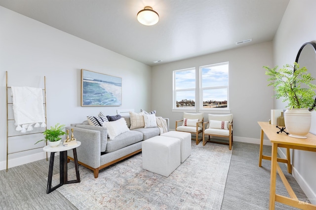 652 N Morning Glory, Eagle, ID 83616 - living room featuring baseboards, visible vents, and light colored carpet