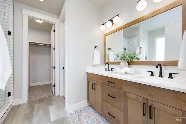 652 N Morning Glory, Eagle, ID 83616 - full bathroom with a spacious closet, double vanity, a sink, and a shower stall