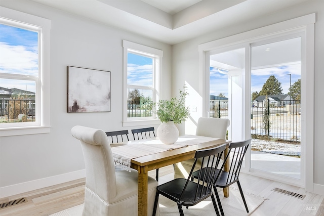 652 N Morning Glory, Eagle, ID 83616 - dining area featuring baseboards, visible vents, and light wood-style floors