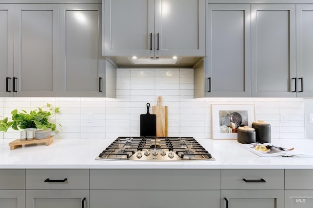 652 N Morning Glory, Eagle, ID 83616 - kitchen with stainless steel gas cooktop, gray cabinets, light countertops, and tasteful backsplash