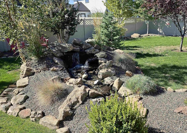 view of yard with fence