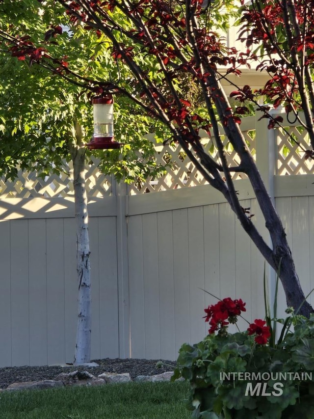 view of gate featuring fence