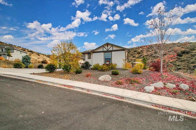 view of front of home with a mountain view