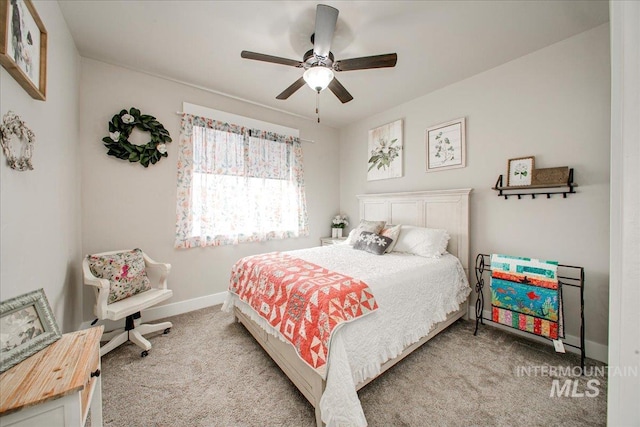 bedroom with light colored carpet and ceiling fan