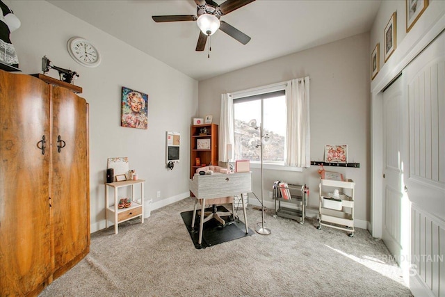 office space featuring carpet and ceiling fan