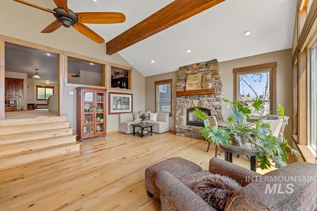 41 Knob Hill Dr, Mccall, ID 83638 - living room with a stone fireplace, wood finished floors, ceiling fan, recessed lighting, and stairway