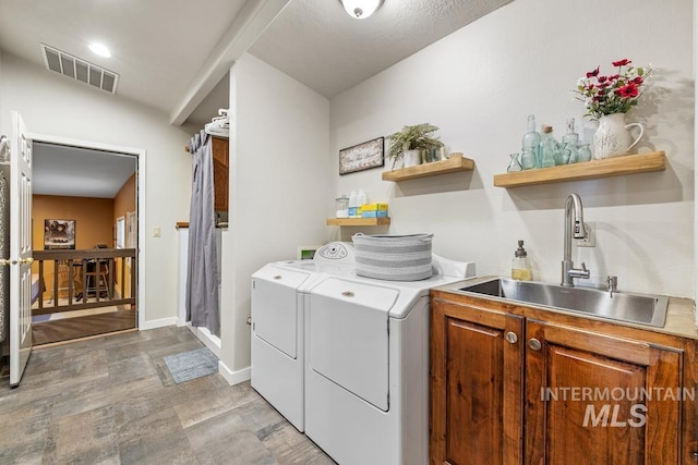 41 Knob Hill Dr, Mccall, ID 83638 - laundry room featuring independent washer and dryer, cabinet space, and baseboards