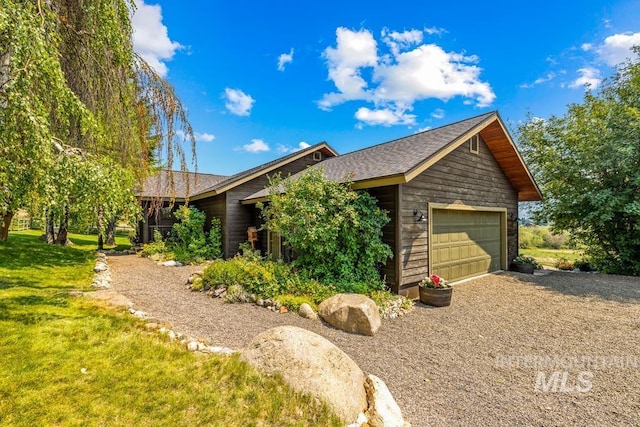 41 Knob Hill Dr, Mccall, ID 83638 - view of home's exterior featuring a yard and gravel driveway