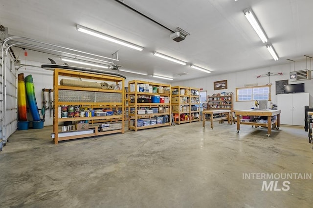 41 Knob Hill Dr, Mccall, ID 83638 - garage featuring a workshop area and a garage door opener