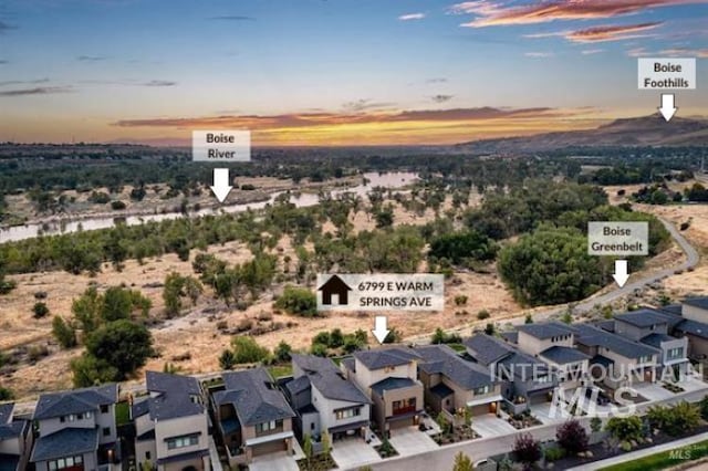 6799 E Warm Springs Ave, Boise, ID 83716 - aerial view at dusk of a residential view
