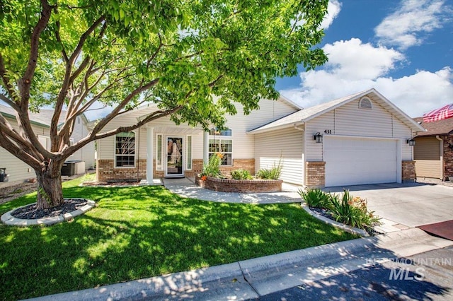 431 N David Frost St, Nampa, ID 83651 - view of front of property with brick siding, a garage, concrete driveway, and a front lawn