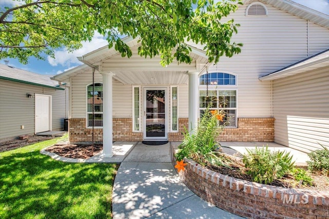 431 N David Frost St, Nampa, ID 83651 - doorway to property featuring brick siding